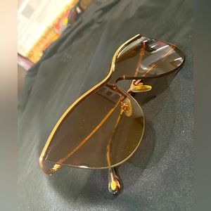 Tiffany and co butterfly sun glass. Like new. No case.